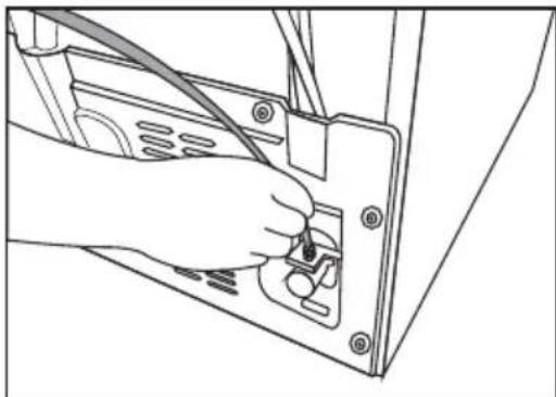 Line drawing of a hand inserting a cable into a device panel (no text or symbols).