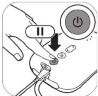 Diagram showing a hand inserting a power button into a plug, with a double-headed arrow indicating the process.