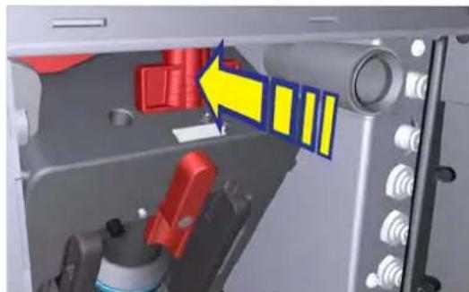 Close-up of a mechanical device interior with red and yellow components, no visible text or symbols.