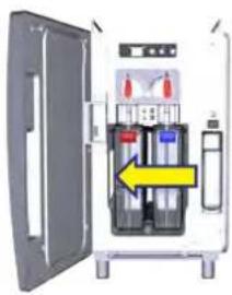 Diagram of an open industrial machine with internal compartments and a yellow arrow indicating a directional component (no text or symbols present).