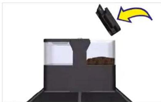 Diagram of a container with contents and a black arrow indicating rotation (no text or symbols)