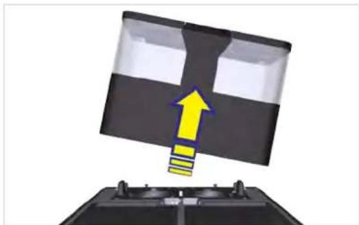 Diagram showing a device with a yellow upward arrow emerging from its screen, mounted on a base (no text or symbols present).