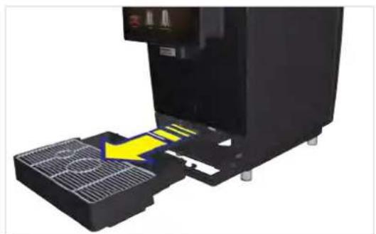 Industrial machine with yellow arrow indicating compression or disassembly process (no visible text or symbols)