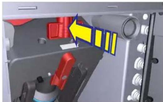 Interior view of a mechanical device with red and yellow components, no visible text or symbols.