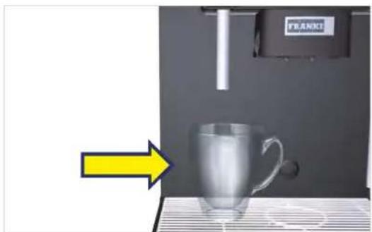 Exterior view of a FRANKI coffee maker machine with a metallic cup on a metal tray (no text or symbols visible)