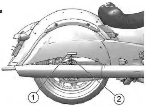 Technical diagram of a car's front wheel assembly with labeled parts 1 and 2