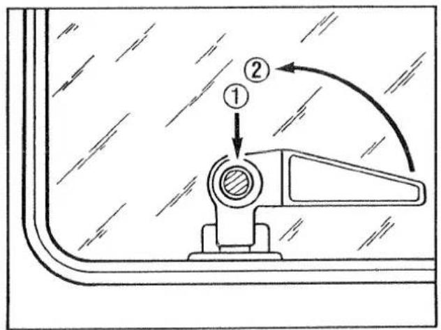 Diagram showing a mechanical component with labeled parts and directional arrow, likely illustrating a motion or assembly process.