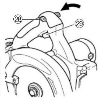 Technical diagram of a vehicle's front wheel assembly with numbered parts and an arrow indicating rotation direction.