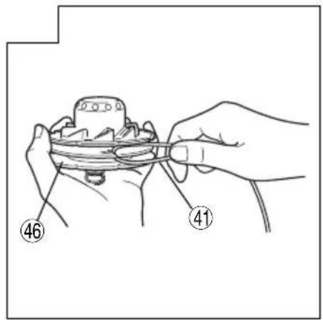 Diagram showing hands holding a device with numbered parts labeled 46 and 41