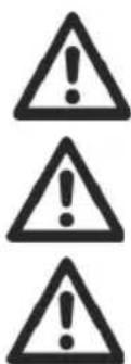 Three warning symbols: three in black triangles with exclamation marks, indicating caution or hazard.