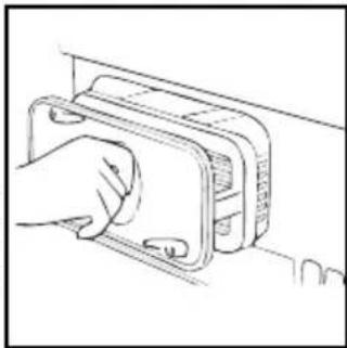Line drawing of a hand inserting a card into a device (no text or symbols)