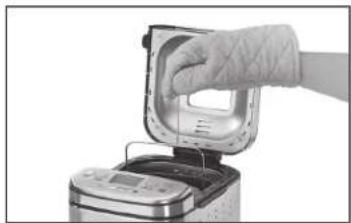 CUISINART CBK-110 - TO REMOVE BREAD FROM PAN - 1