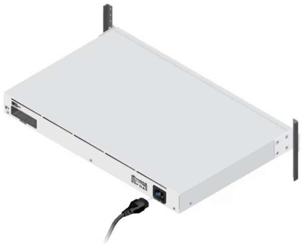 Exterior view of a white server rack with attached cable (no visible text or symbols)
