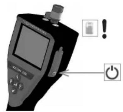 Diagram of a medical device with warning labels and power button, showing screen, control panel, and warning icon