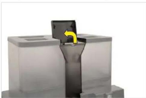 3D rendering of a mechanical component with a yellow arrow indicating direction, no visible text or symbols.