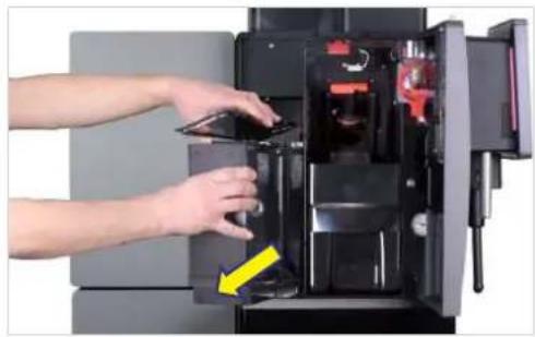 Person inserting a device into an open device (no visible text or symbols).