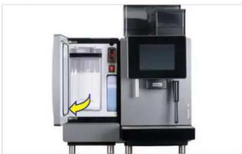 Industrial machine with open door and control panel, no visible text or symbols.