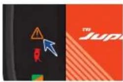 Close-up of a warning sign with an orange triangle and blue arrow pointing to a red object, next to a partial logo with 'Juni' text.