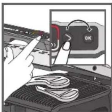 Diagram showing a hand pressing a button labeled 'OK' on a device screen, with a close-up view highlighting the action.
