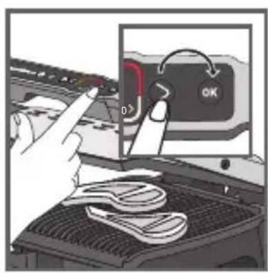 Diagram showing a hand pressing a button labeled 'OK' on a device with a red curved arrow indicating rotation or adjustment.