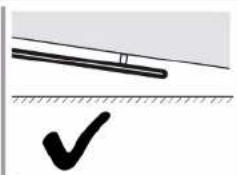 Simple line drawing of a pencil and a checkmark on a surface (no text or symbols)