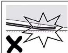 Diagram showing a star-shaped object with a cross mark and a ruler, no text or symbols present