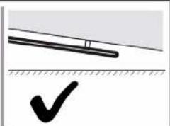 Simple line drawing of a tool on a surface with a checkmark below (no text or symbols)