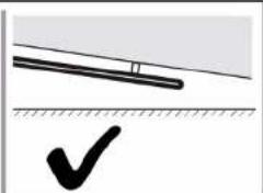 Simple line drawing of a tool on an inclined plane and a checkmark below (no text or symbols)