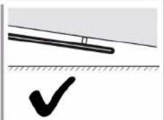 Simple line drawing of a pencil and a checkmark on a surface (no text or symbols)