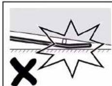 Diagram showing a star-shaped object with a cross mark and a ruler, no text or symbols present