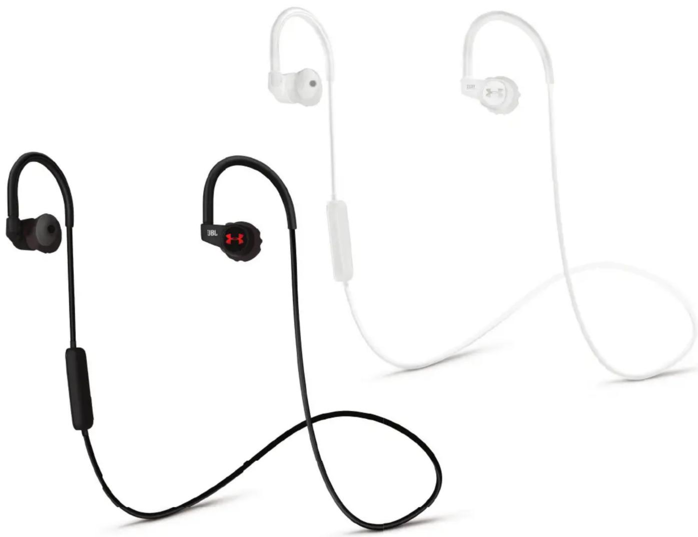 Three black and white wireless earbuds with charging cables, no visible text or symbols