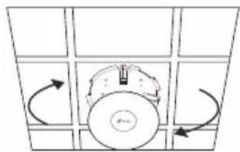 Diagram of a circular object with directional arrows indicating rotation or movement, surrounded by grid panels (no text or symbols)
