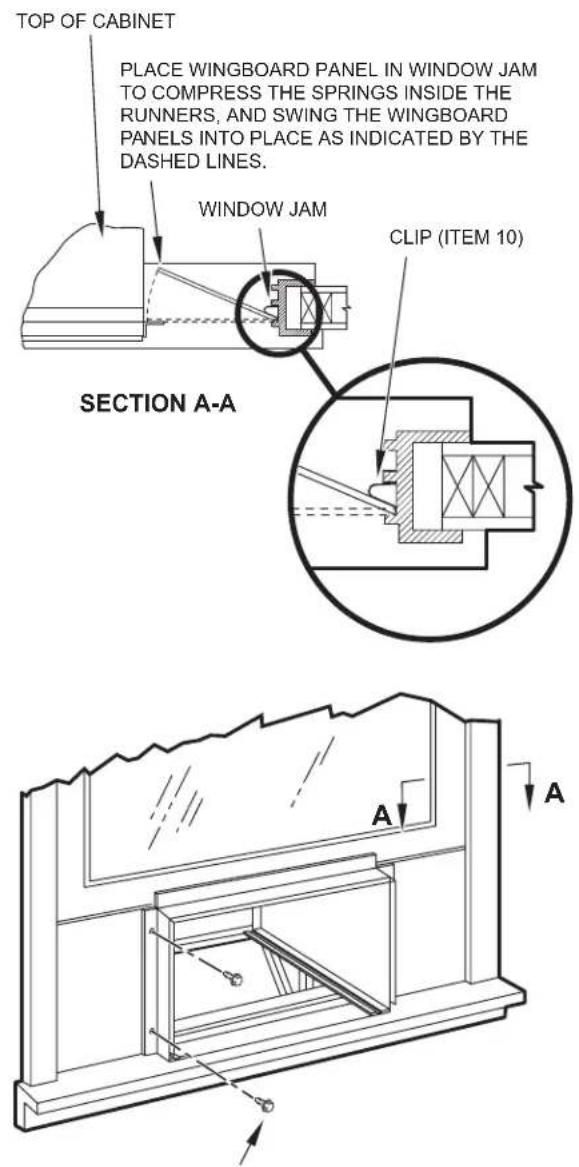 TOP OF CABINET PLACE WINGBOARD PANEL IN WINDOW JAM TO COMPRESS THE SPRINGS INSIDE THE RUNNERS, AND SWING THE WINGBOARD PANELS INTO PLACE AS INDICATED BY THE DASHED LINES. WINDOW JAM CLIP (ITEM 10) SECTION A-A A A