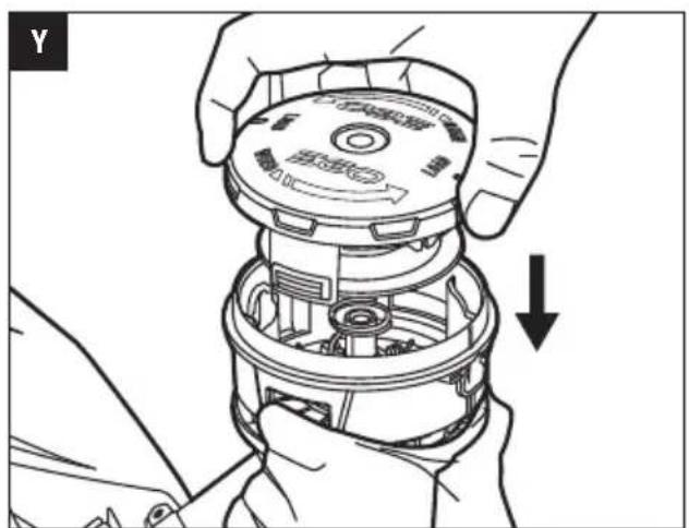 Illustration of hands assembling a mechanical component with a downward arrow indicating assembly (no text or symbols present)