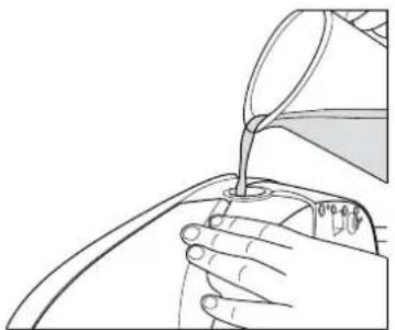 Line drawing of a hand pouring liquid from a funnel into a pipe (no text or symbols)