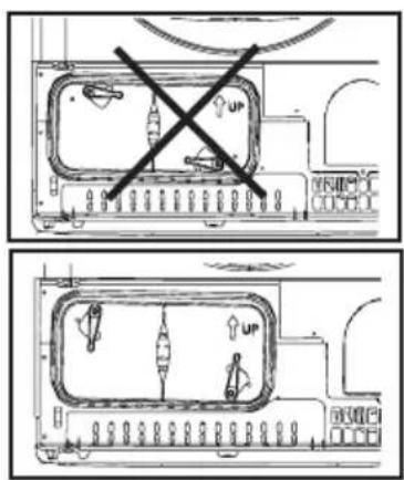 Diagram showing two layout layouts with a crossed-out 'UP' symbol indicating a parking or parking restriction.
