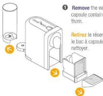 Remove the wa capsule containe them. Retirez le résen le bac à capsule nettoyer.