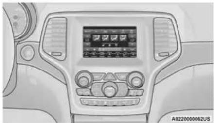 Interior view of a car dashboard with air conditioner and control panel (no visible text or symbols)