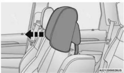 Interior view of a car seatbelt and backrest, showing no text or symbols on the vehicle itself