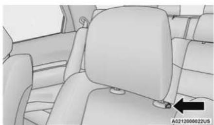Interior view of a car seatbelt with visible seat, driver seat, and rear seats (no text or symbols)