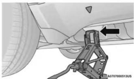 Mechanical assembly diagram showing a vehicle's wheel and suspension bracket (no text or symbols)