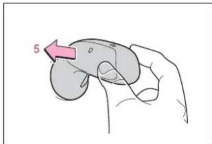 Illustration of a hand holding a small object with a pink arrow labeled '5' pointing to the part (no text or symbols on the object itself)