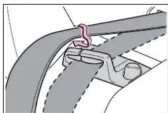 Mechanical assembly diagram showing a curved pipe joint with a pink clamp (no text or symbols)
