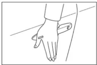 Line drawing of a hand gripping a piece of paper or tape (no text or symbols)