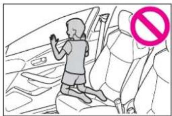 Illustration of a child sitting in a car seat with a no-smoking symbol (no text or labels)