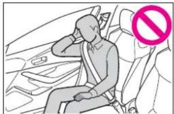 Line drawing of a person sitting in a car seat with a 'no' symbol overlay (no text or symbols on the diagram itself)