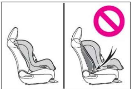 Two side-by-side illustrations of a car seat with a no-smoking symbol (no text or labels)