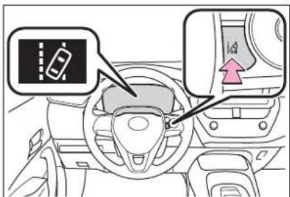 Diagram showing car interior with a traffic sign and directional arrow, likely indicating vehicle movement or navigation.