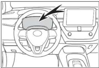 Interior view of a car dashboard and steering wheel (no text or symbols visible)