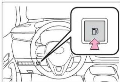Interior view of a car dashboard with a highlighted screen icon (no text or symbols)